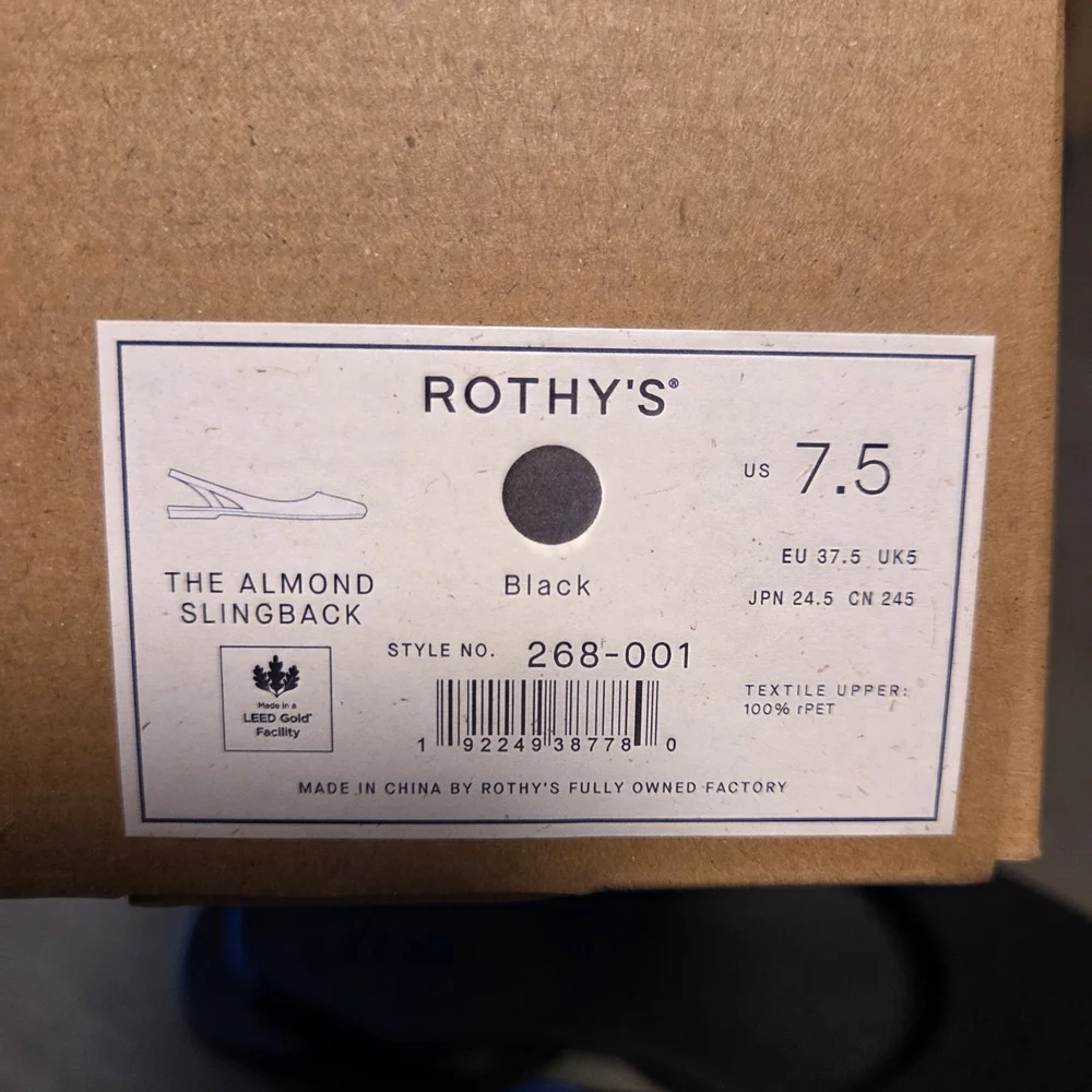 Rothy's Almond Slingback Flats in Black with Blue Heel Accent